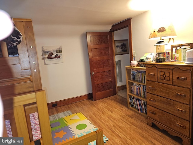 bedroom featuring light hardwood / wood-style flooring