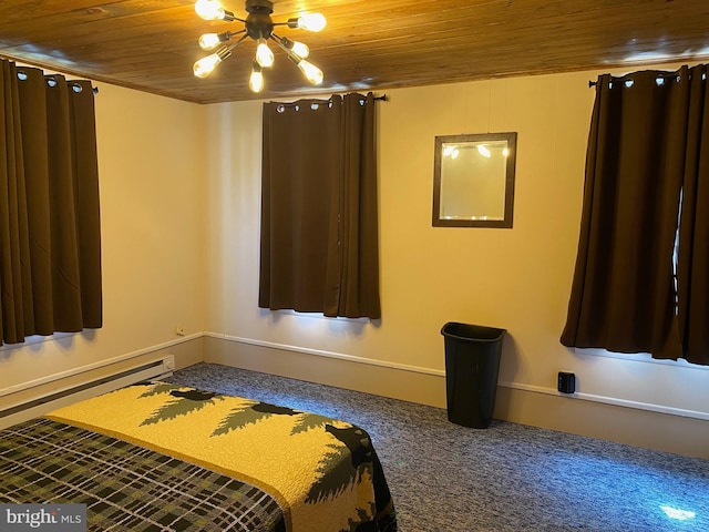 unfurnished bedroom featuring wood ceiling, a baseboard heating unit, and a notable chandelier