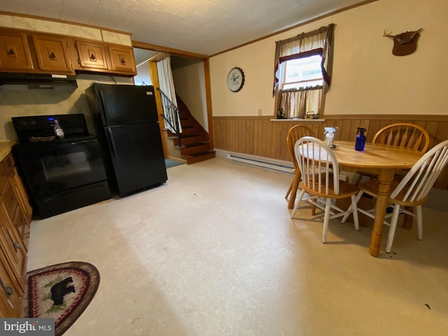 dining area featuring a baseboard radiator, wainscoting, and stairway