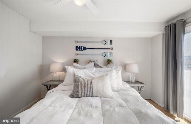 bedroom featuring ceiling fan and hardwood / wood-style floors