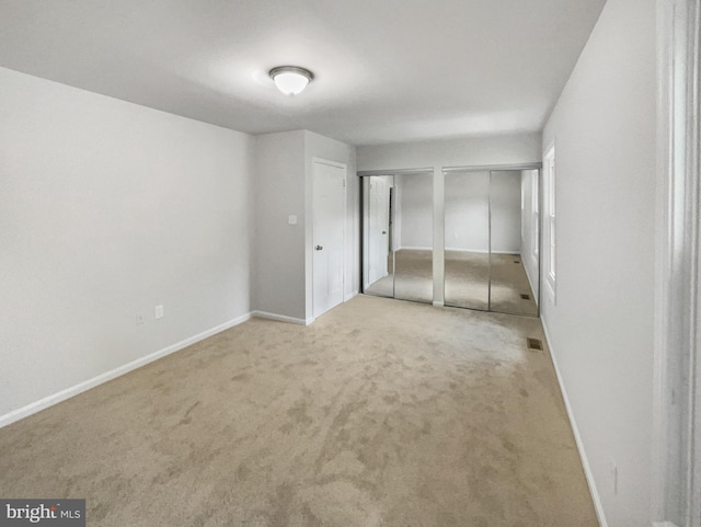 basement with light colored carpet