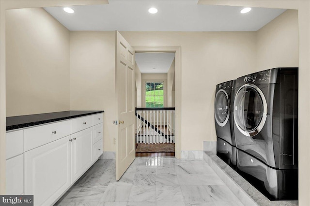 laundry area featuring recessed lighting, marble finish floor, washer and clothes dryer, and laundry area