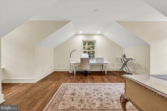 office space featuring recessed lighting, vaulted ceiling, dark wood finished floors, and baseboards