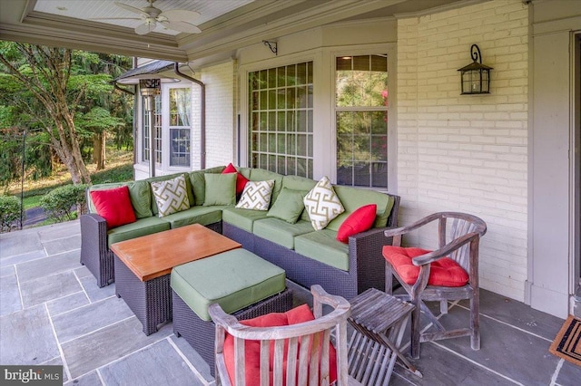 view of patio with outdoor lounge area and a ceiling fan