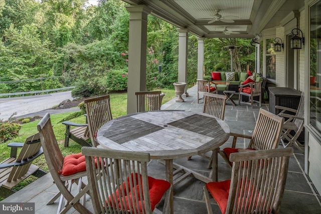 view of patio / terrace featuring outdoor dining area and a ceiling fan