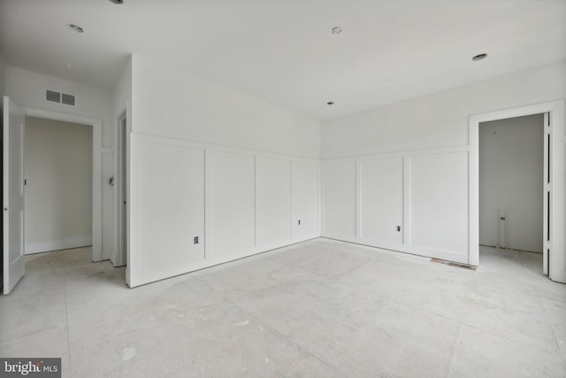 unfurnished bedroom featuring visible vents