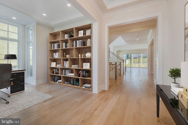 interior space featuring light wood-type flooring, baseboards, and recessed lighting