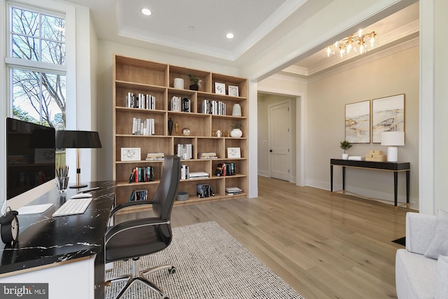 office with crown molding, recessed lighting, a raised ceiling, light wood-style flooring, and baseboards