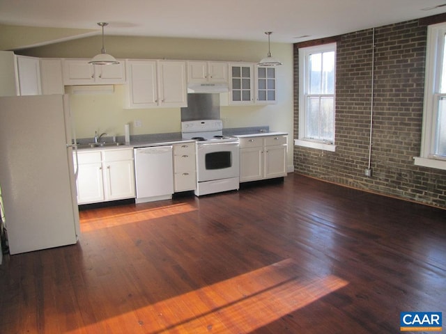 kitchen featuring dark hardwood / wood-style flooring, white cabinets, pendant lighting, and white appliances