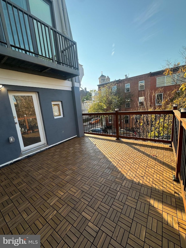 view of patio with a balcony