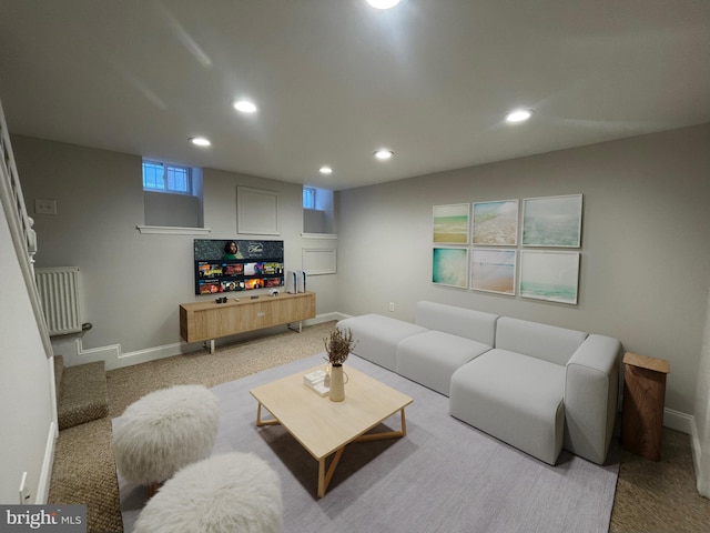 living room featuring recessed lighting, baseboards, light colored carpet, and stairs