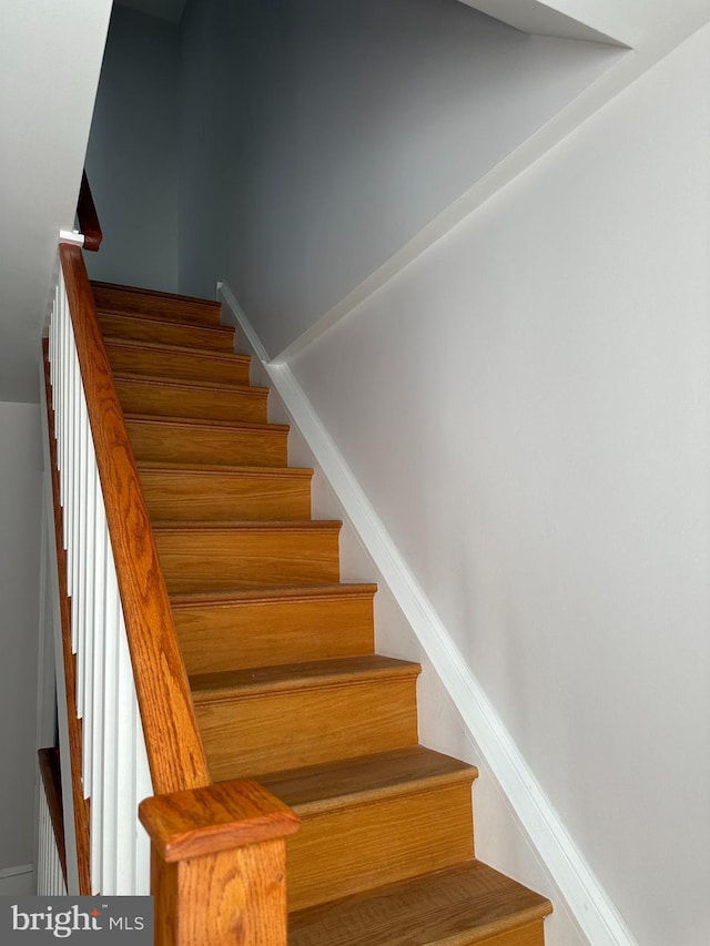 stairway with baseboards