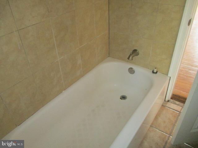 bathroom featuring tile patterned flooring