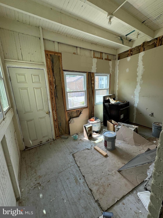 interior space featuring beamed ceiling