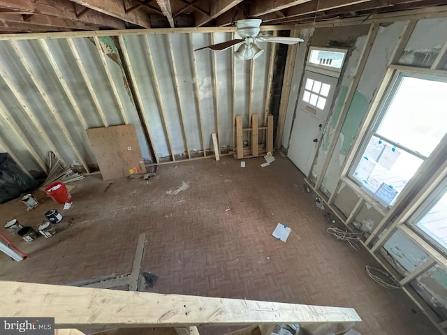 interior space featuring ceiling fan