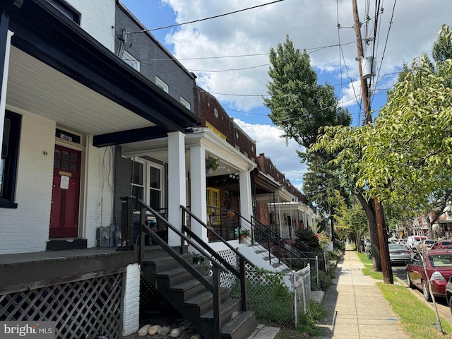 exterior space featuring covered porch