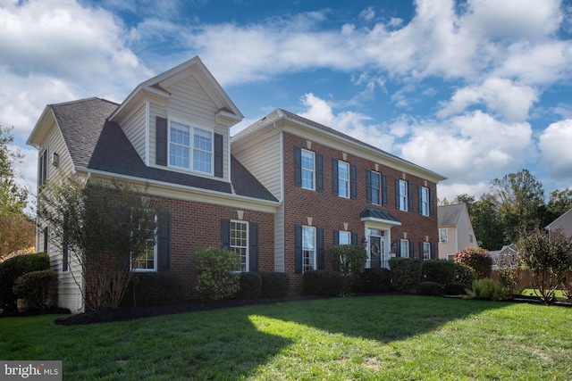 view of front of house with a front lawn