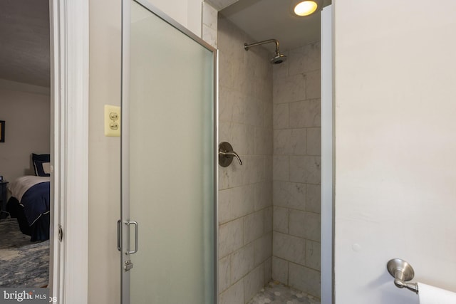 full bathroom with a stall shower and connected bathroom