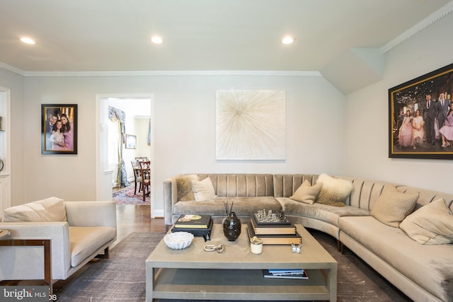 living room with dark hardwood / wood-style floors and crown molding