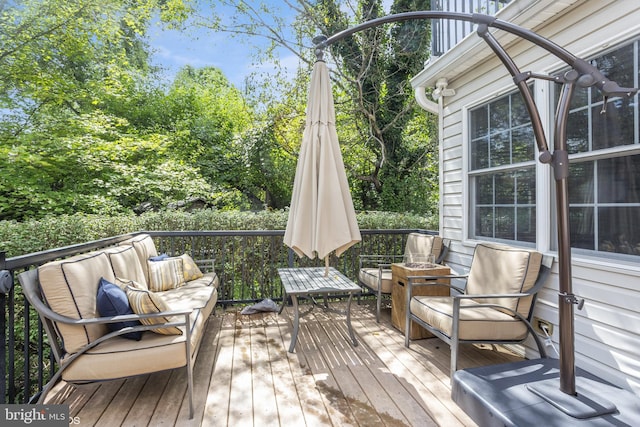 deck with an outdoor hangout area