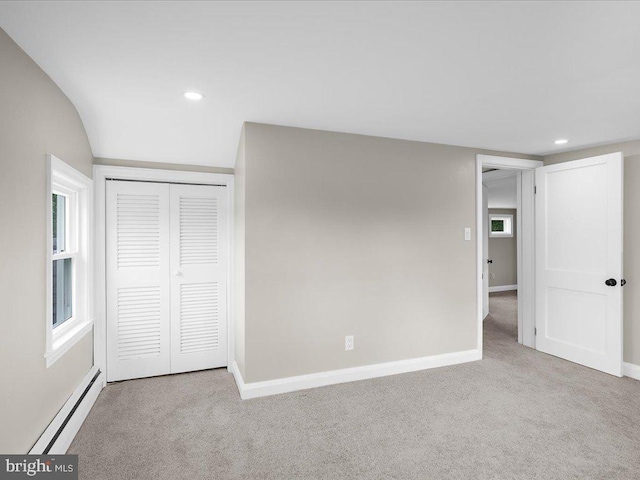 2731 Old Washington Rd, Westminster, MD 21157 - unfurnished bedroom featuring a closet, a baseboard radiator, carpet flooring, and baseboards