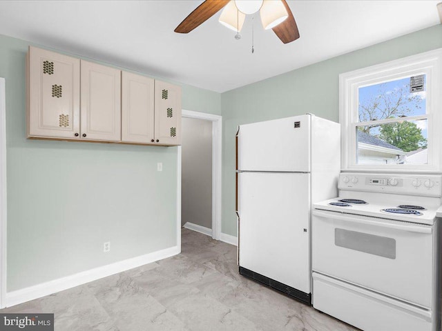 kitchen featuring white appliances and ceiling fan