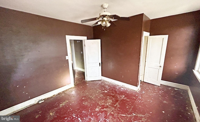 unfurnished bedroom featuring ceiling fan