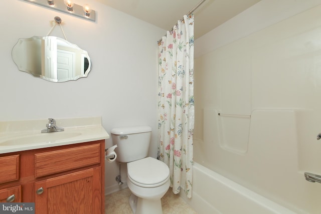 full bathroom with shower / tub combo with curtain, toilet, vanity, and tile patterned floors