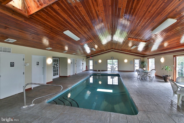 view of swimming pool with a skylight