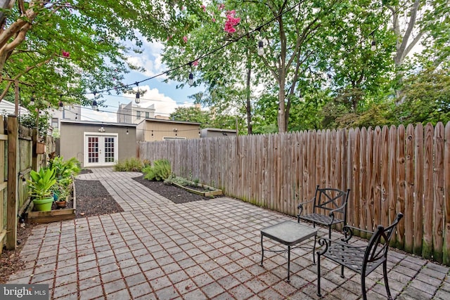 view of patio with a fenced backyard and french doors