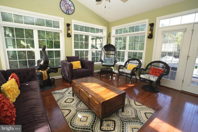 sunroom with a ceiling fan and lofted ceiling