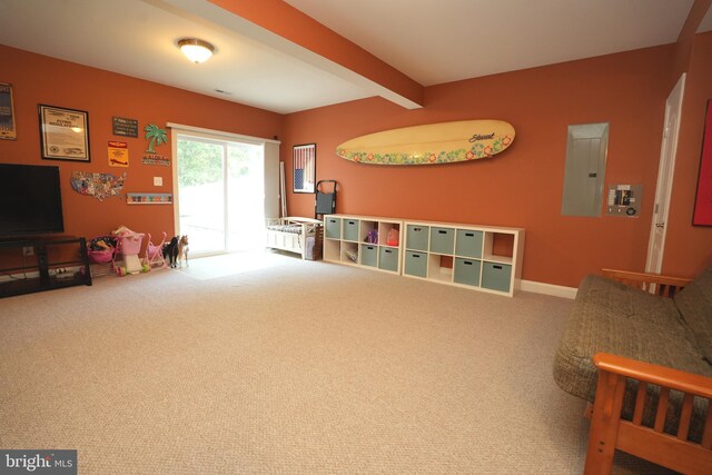 game room with electric panel, beam ceiling, and carpet flooring