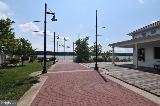 view of home's community with a water view