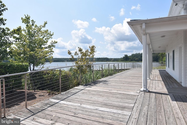 deck featuring a water view