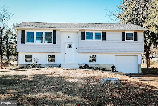 raised ranch with a garage