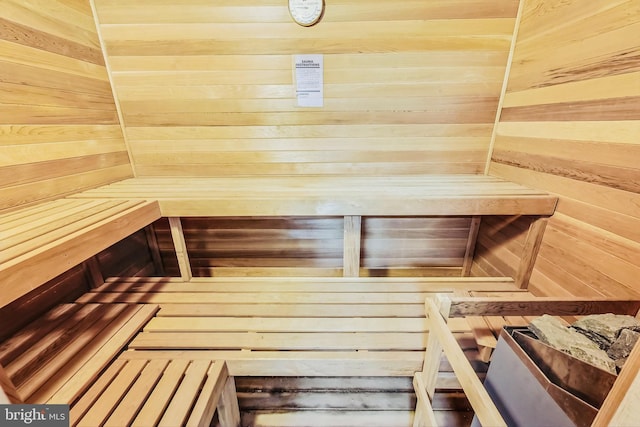 view of sauna / steam room with wooden walls