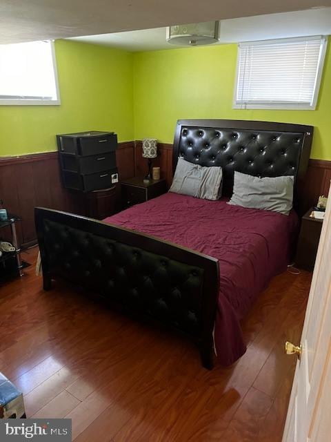 bedroom with wood-type flooring