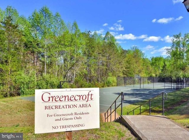 exterior space featuring tennis court