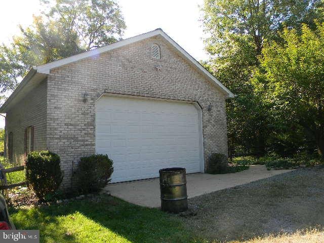 view of home's exterior with a garage