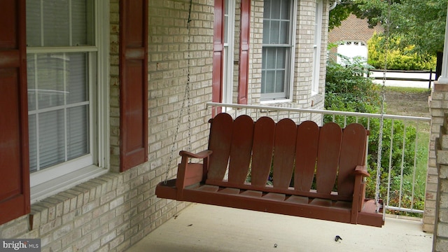 balcony featuring covered porch