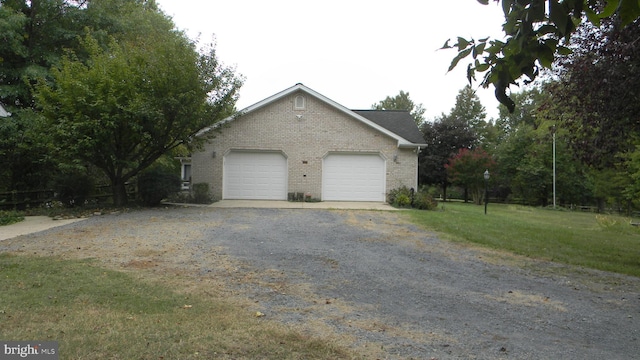 exterior space featuring gravel driveway