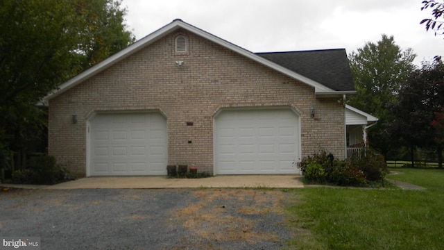 view of property exterior with brick siding