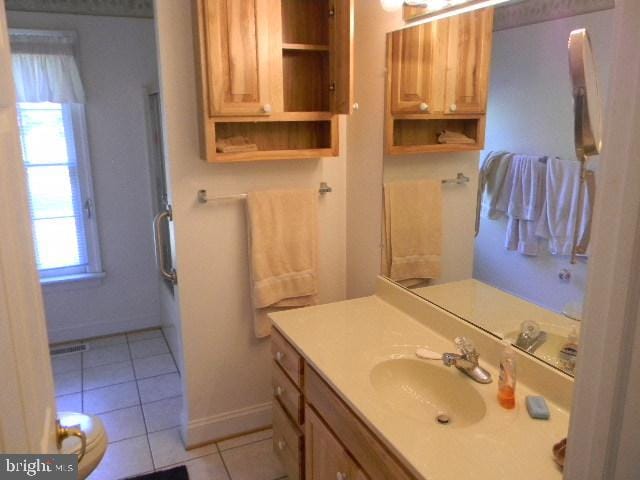 bathroom featuring vanity and tile patterned floors