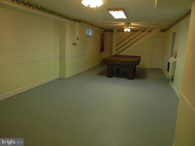 playroom with pool table and radiator heating unit