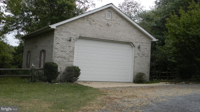 garage with fence