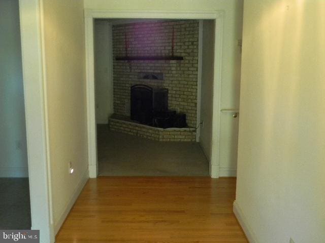 hallway with light wood-style flooring