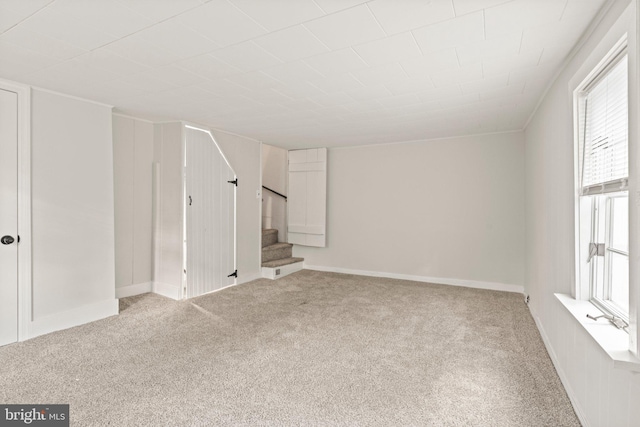 interior space featuring light colored carpet