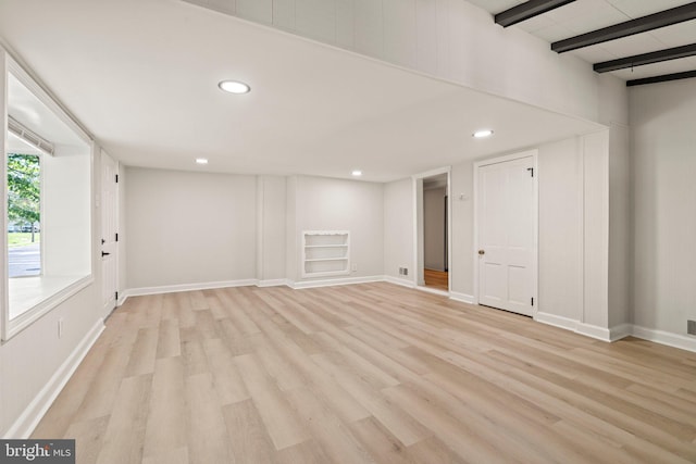 basement featuring light hardwood / wood-style flooring