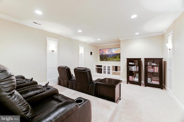 cinema room featuring light carpet and ornamental molding