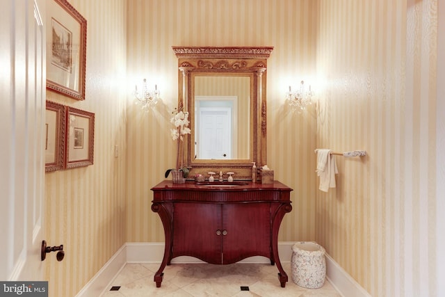 bathroom with vanity and tile patterned floors